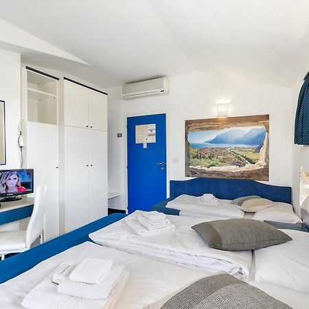 Bike & Wind Hotel Villa Maria Torbole Sul Garda Extérieur photo