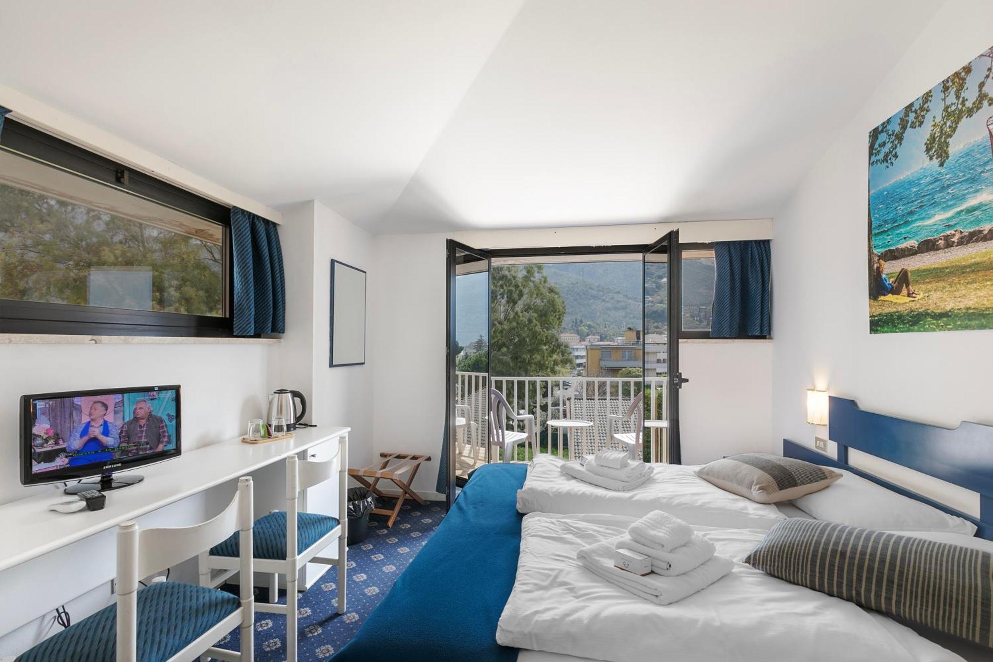 Bike & Wind Hotel Villa Maria Torbole Sul Garda Extérieur photo